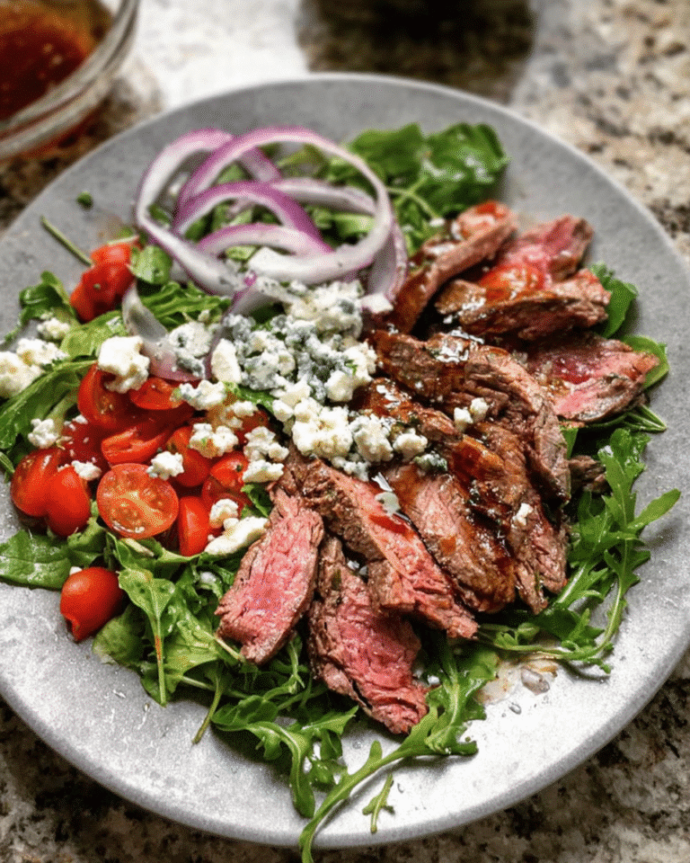 Grilled steak salad with greens and balsamic dressing
