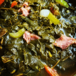 Southern Mixed Greens in a steaming pot with smoked turkey wings