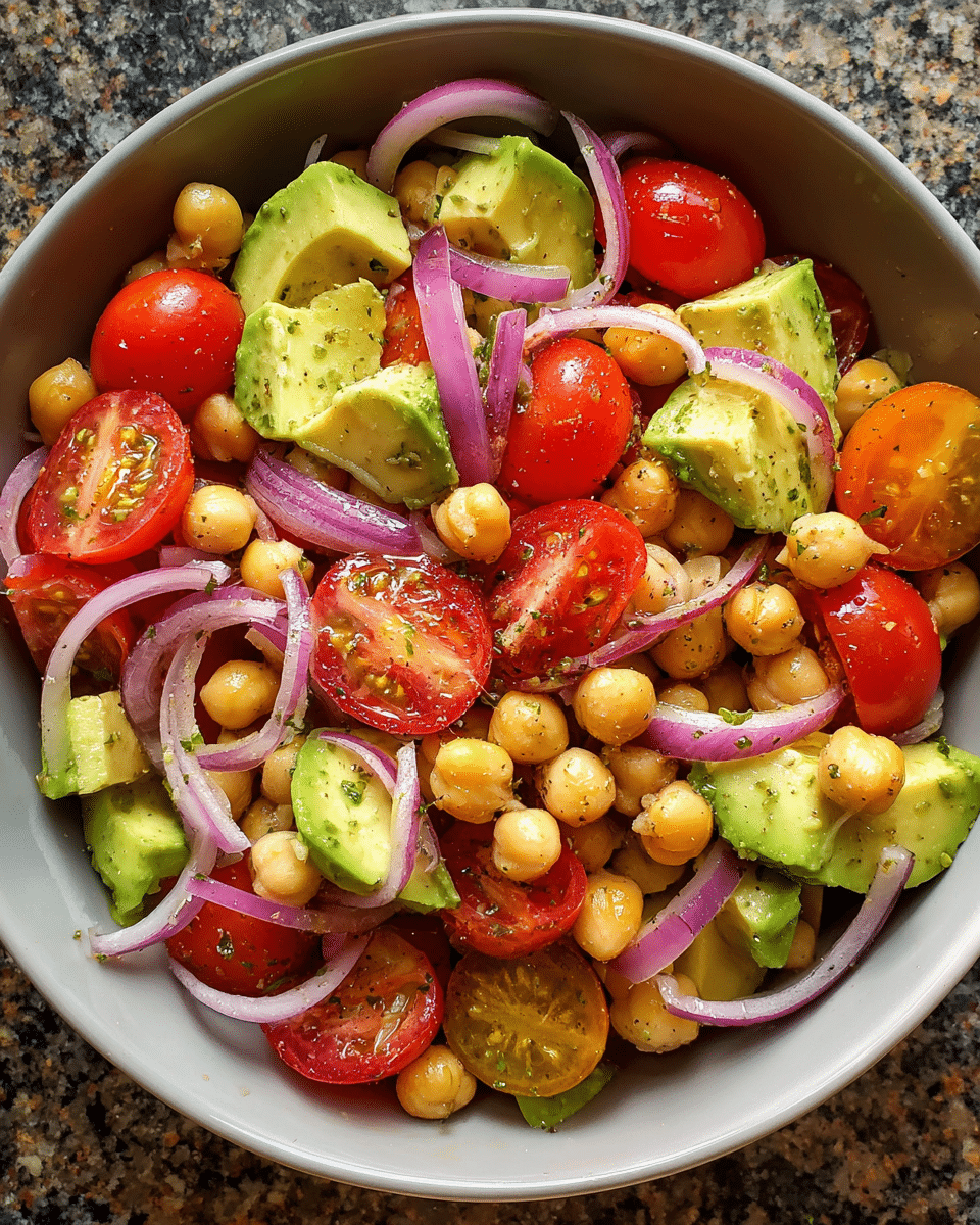 Avocado Chickpea Salad in rustic bowl