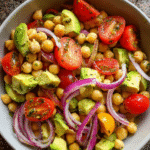 Avocado Chickpea Salad in rustic bowl
