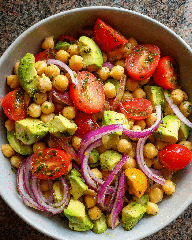 Avocado Chickpea Salad in rustic bowl