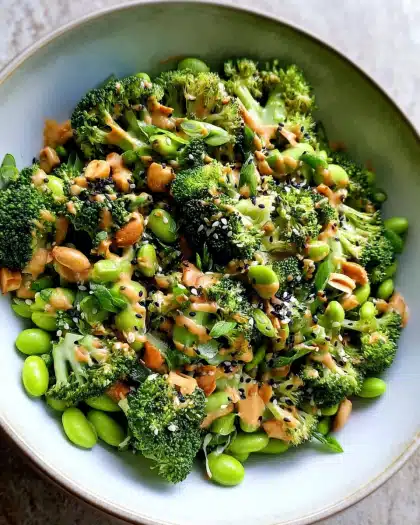 Broccoli salad with peanut sauce in bowl