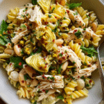 Chicken and Artichoke Pasta Salad in a rustic bowl