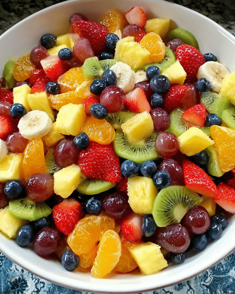 Fruit Salad with Honey Lime Dressing in glass bowl