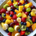 Fruit Salad with Honey Lime Dressing in glass bowl