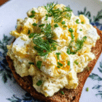 healthy egg salad with herbs and rustic bread