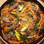 Japchae with beef and vegetables
