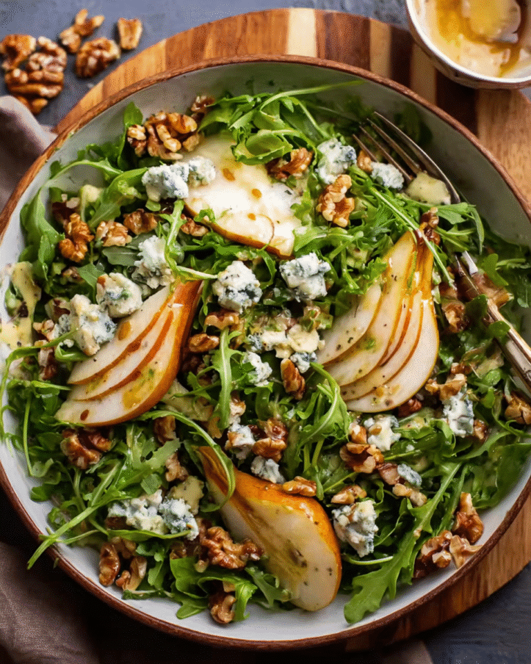 Overhead view of pear salad with blue cheese