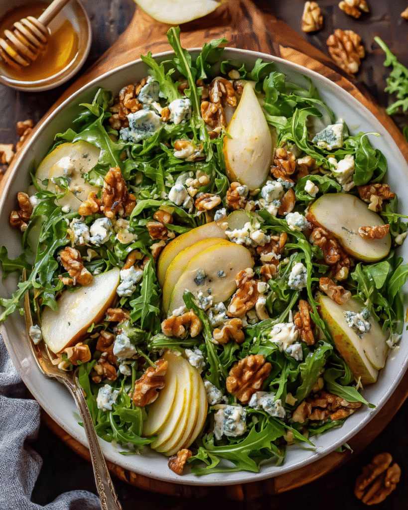 Overhead view of pear salad with blue cheese