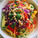 Rainbow Papaya Salad served fresh with colorful vegetables