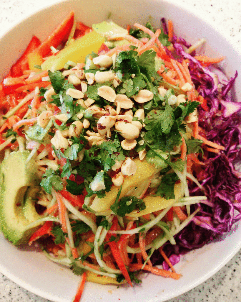 Rainbow Papaya Salad served fresh with colorful vegetables