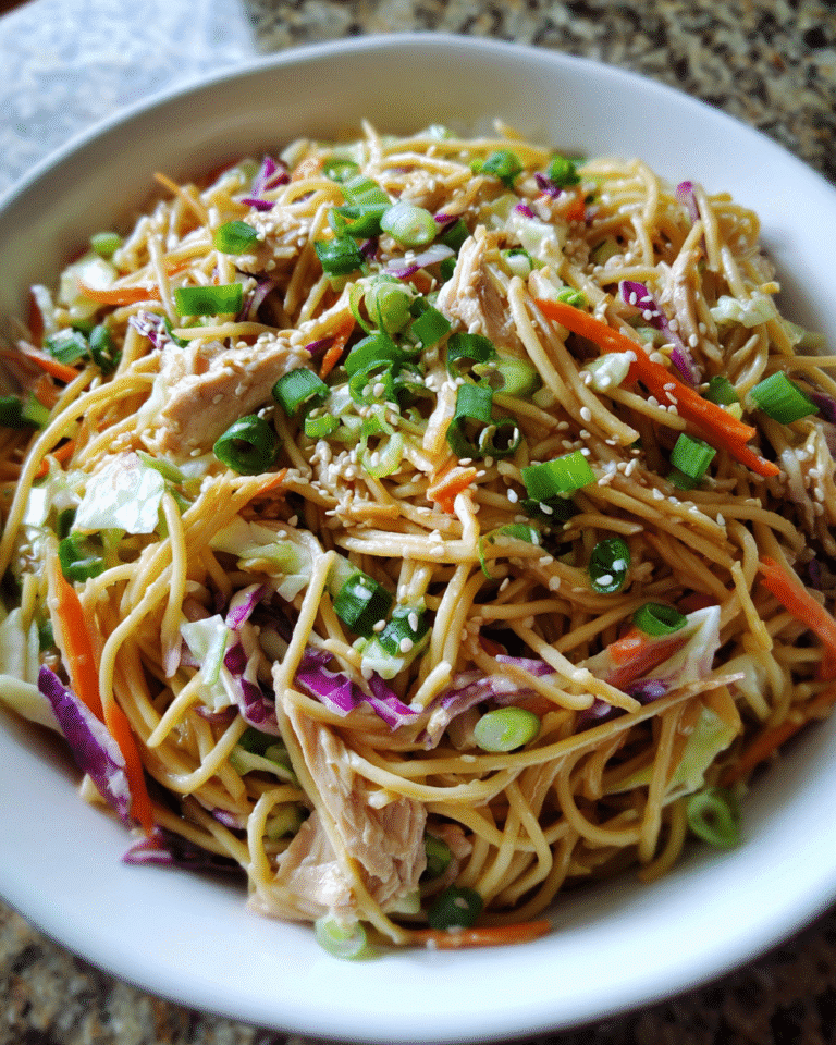sesame noodle salad in ceramic bowl