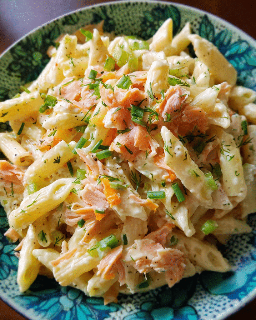 Smoked salmon pasta salad with vegetables and dill