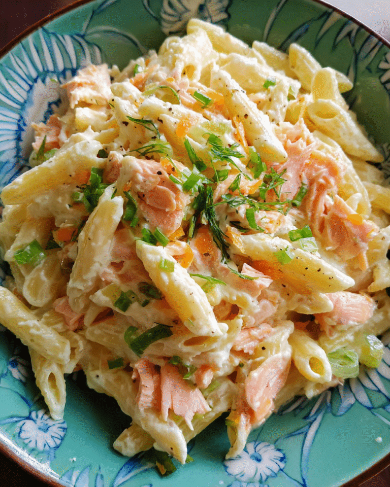 Smoked salmon pasta salad with vegetables and dill