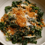 The Perfect Kale Caesar Salad in rustic ceramic bowl