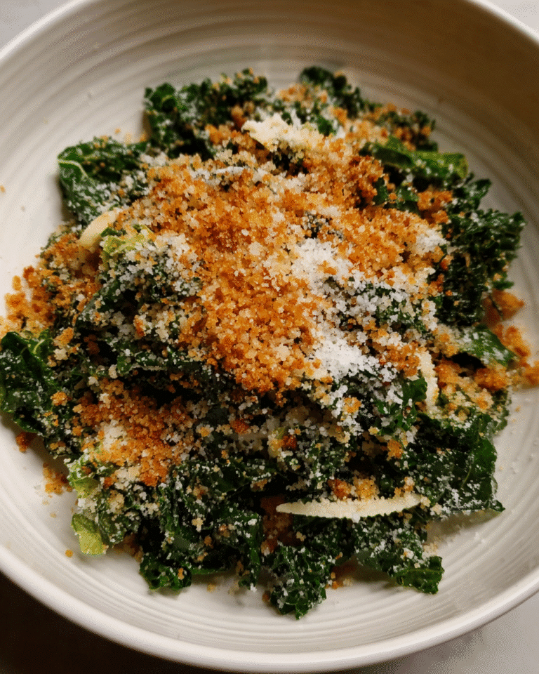 The Perfect Kale Caesar Salad in rustic ceramic bowl