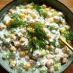 Tzatziki Chickpea Salad in a bowl with cucumbers and dill