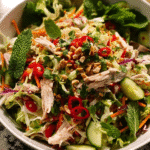 Vietnamese chicken salad served in a ceramic bowl