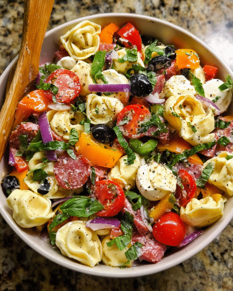 Italian tortellini pasta salad served in rustic bowl