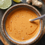 Creamy peanut sauce in a glass bowl