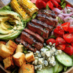Steak salad with grilled corn and blue cheese
