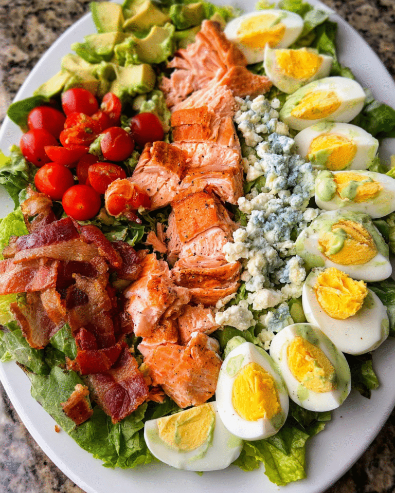 Salmon Cobb Salad with creamy avocado dressing on platter