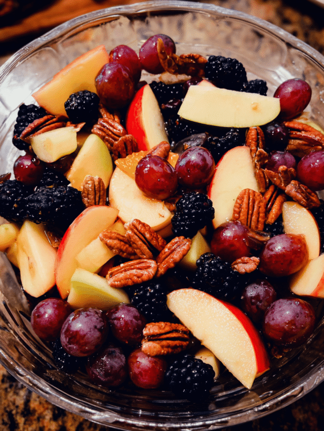 Colorful autumn fruit salad with apples and berries