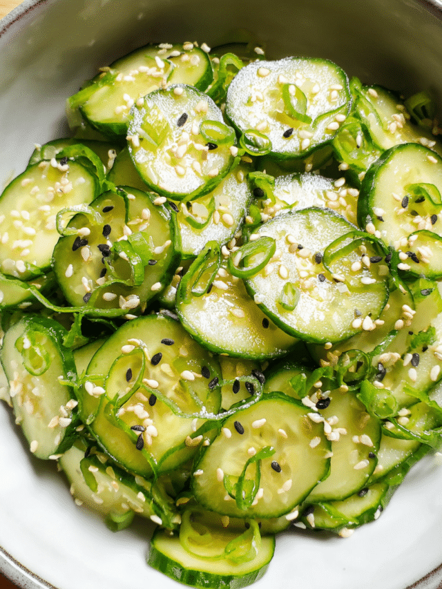 Asian Cucumber Sesame Salad served in bowl with garnishes