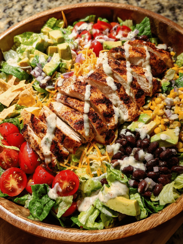 grilled southwest chicken salad in rustic bowl