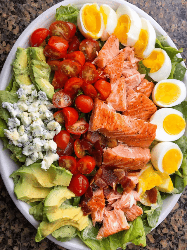 Salmon Cobb Salad with creamy avocado dressing on platter