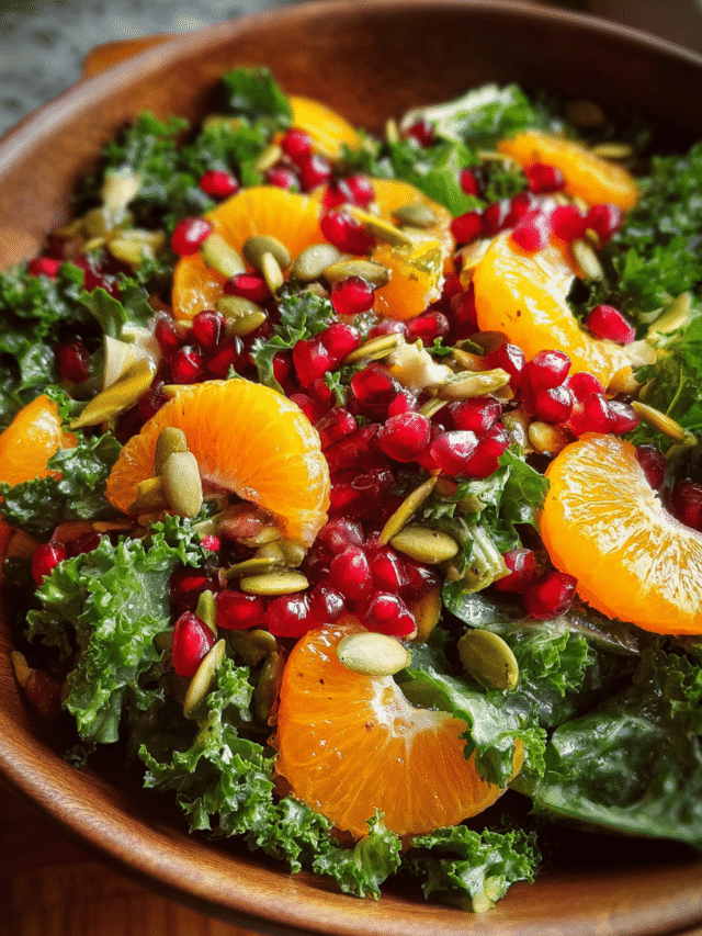 citrus pomegranate kale salad overhead view