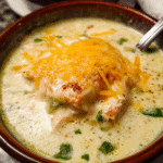 “Featured image of Chile Relleno Soup with roasted poblanos and chicken, served warm in a bowl, from CindyRecipes.”