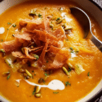 Creamy sweet potato soup with garnishes