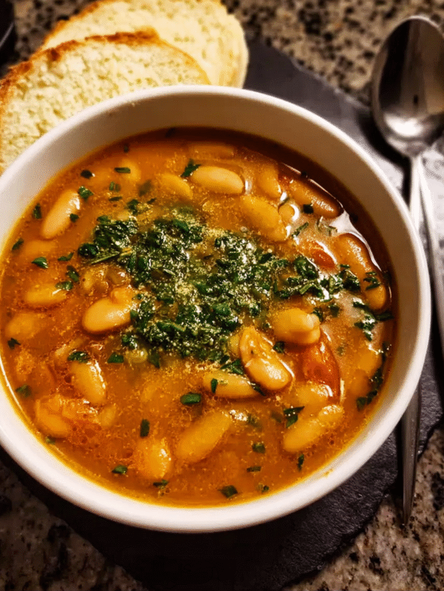 Bean Soup with Picada in ceramic bowl with crusty bread
