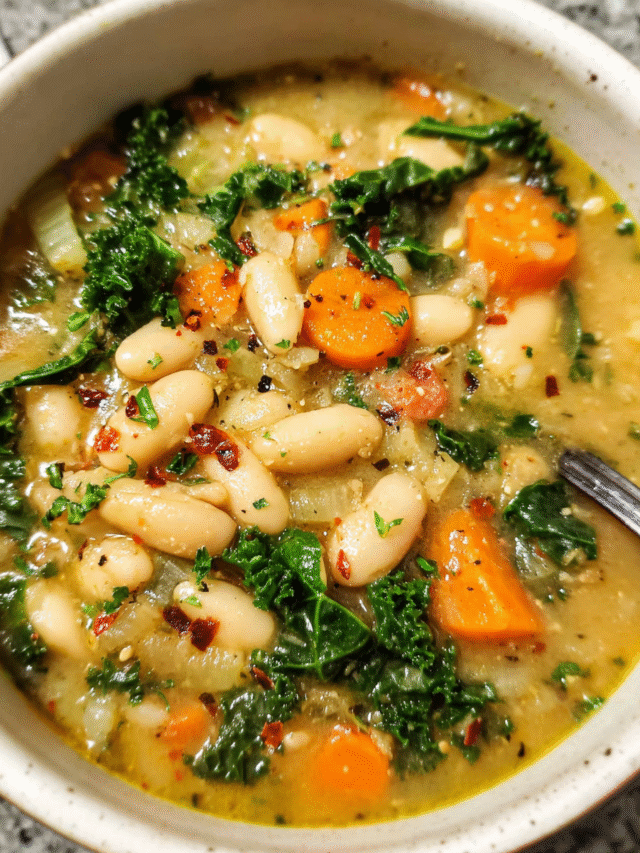 Tuscan White Bean Soup Recipe served in a bowl with carrots, kale, and cannellini beans