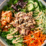Kimchi salad with greens, vegetables, and spicy dressing
