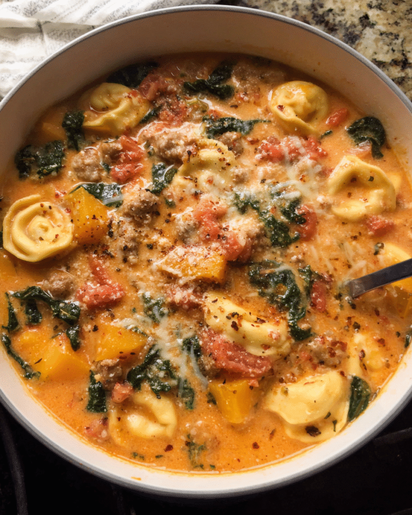 bowl of creamy sausage squash tortellini soup