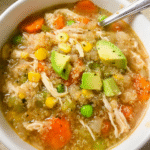 Bowl of homemade Chicken Vegetable Quinoa Soup with vegetables