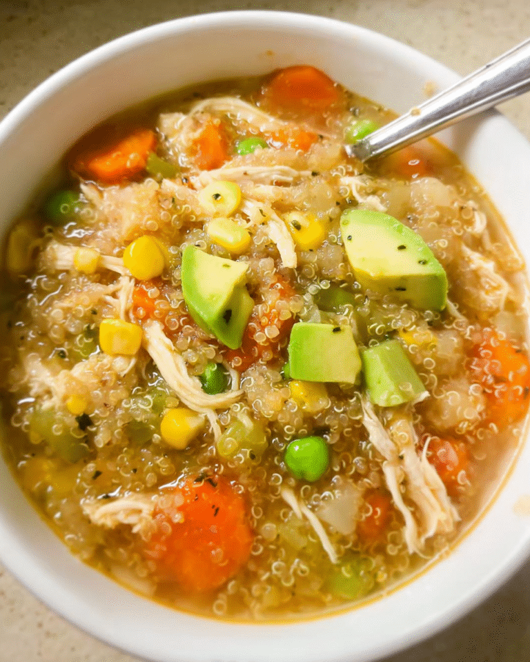 Bowl of homemade Chicken Vegetable Quinoa Soup with vegetables