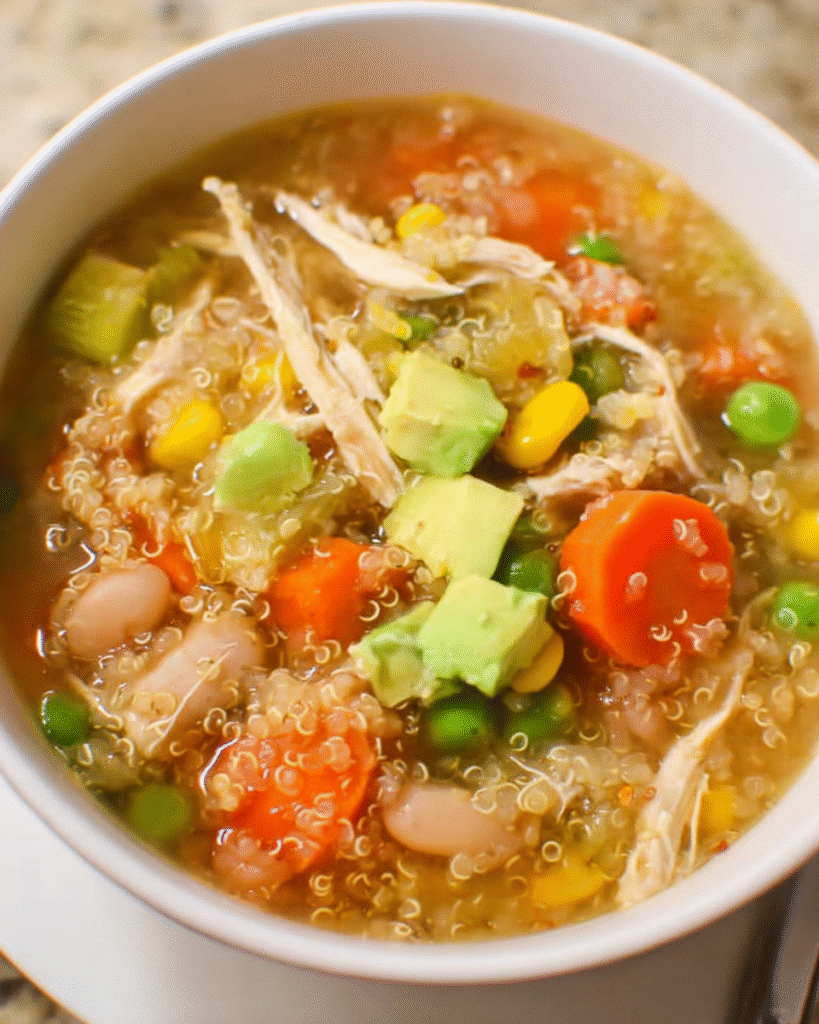 Bowl of homemade Chicken Vegetable Quinoa Soup with vegetables