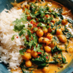 Chickpea curry with spinach served over jasmine rice