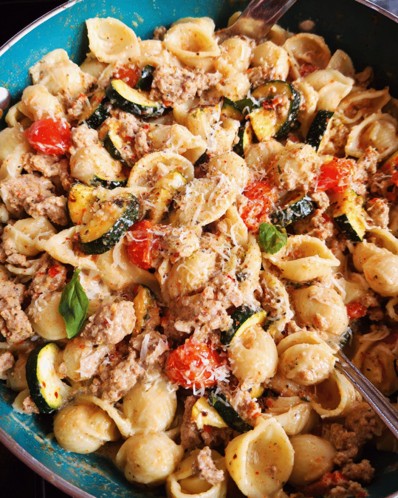 Creamy ground turkey pasta with roasted zucchini and tomatoes