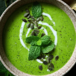 Ginger and Mint Broccoli Pea Soup served in a bowl