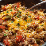 Ground beef and rice skillet cooked in a pan