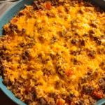 One-pan cheeseburger rice cooked in a skillet