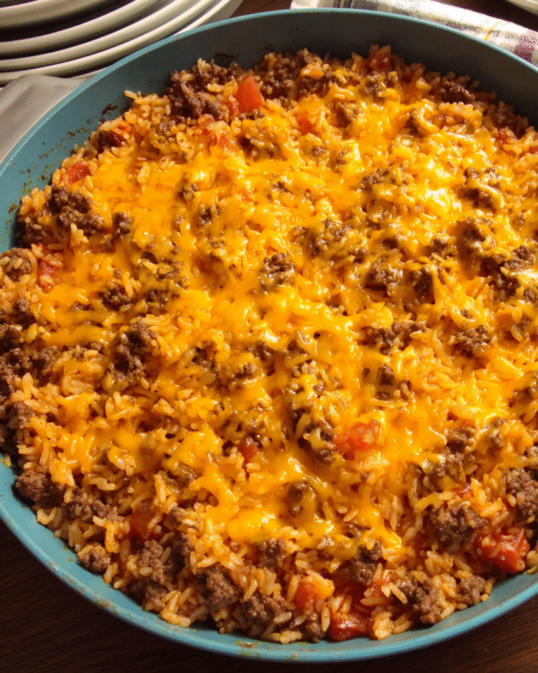 One-pan cheeseburger rice cooked in a skillet