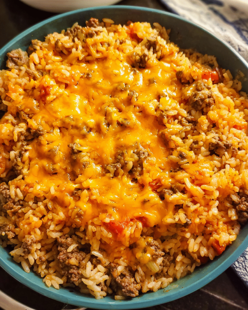 One-pan cheeseburger rice cooked in a skillet