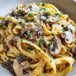 One-pan creamy mushroom pasta served in a skillet