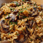 one-pot creamy mushroom and rice cooked in skillet