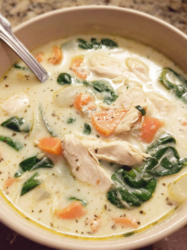 Creamy Chicken Florentine Soup in a bowl with spinach and Parmesan